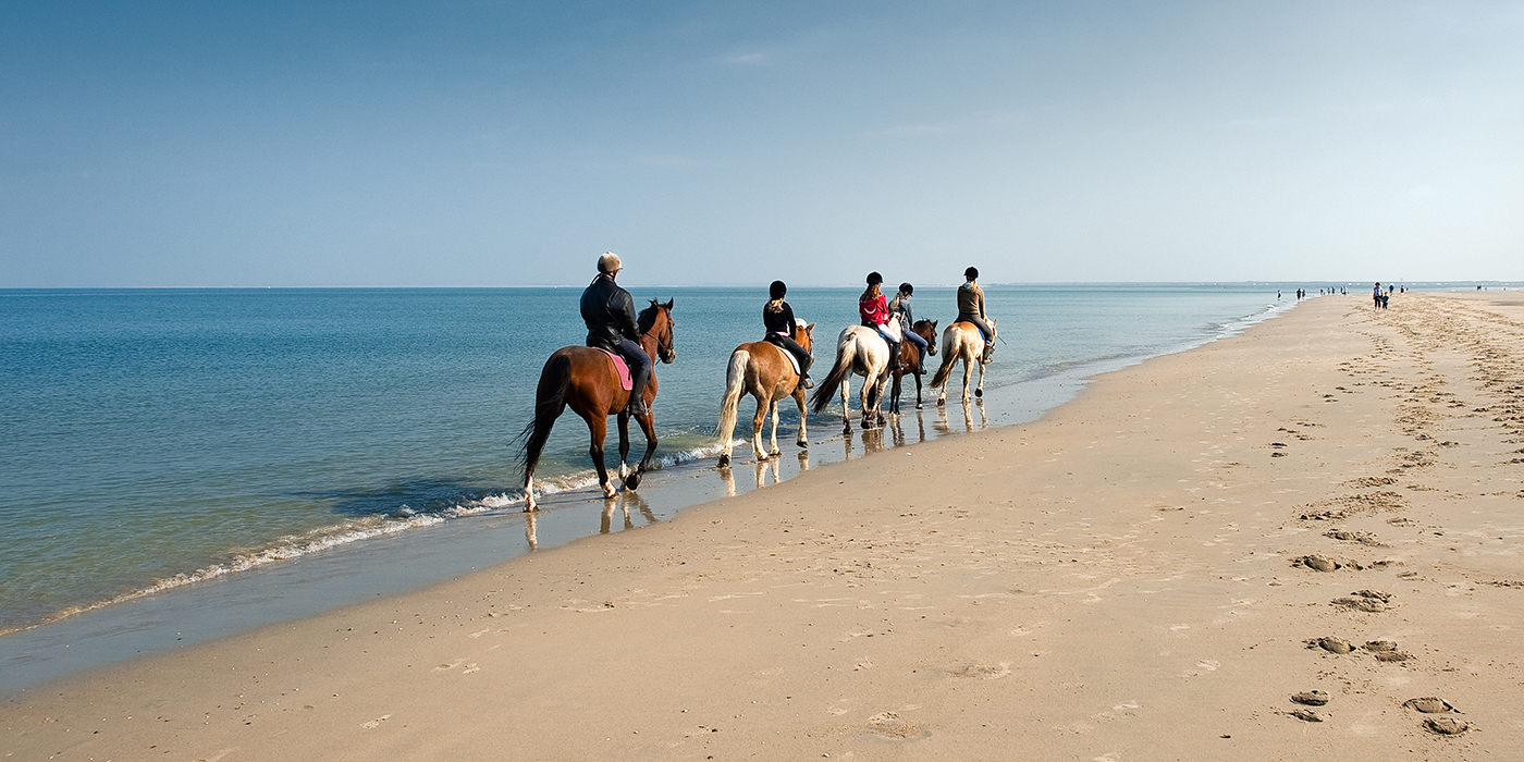 Reiter am Strand
